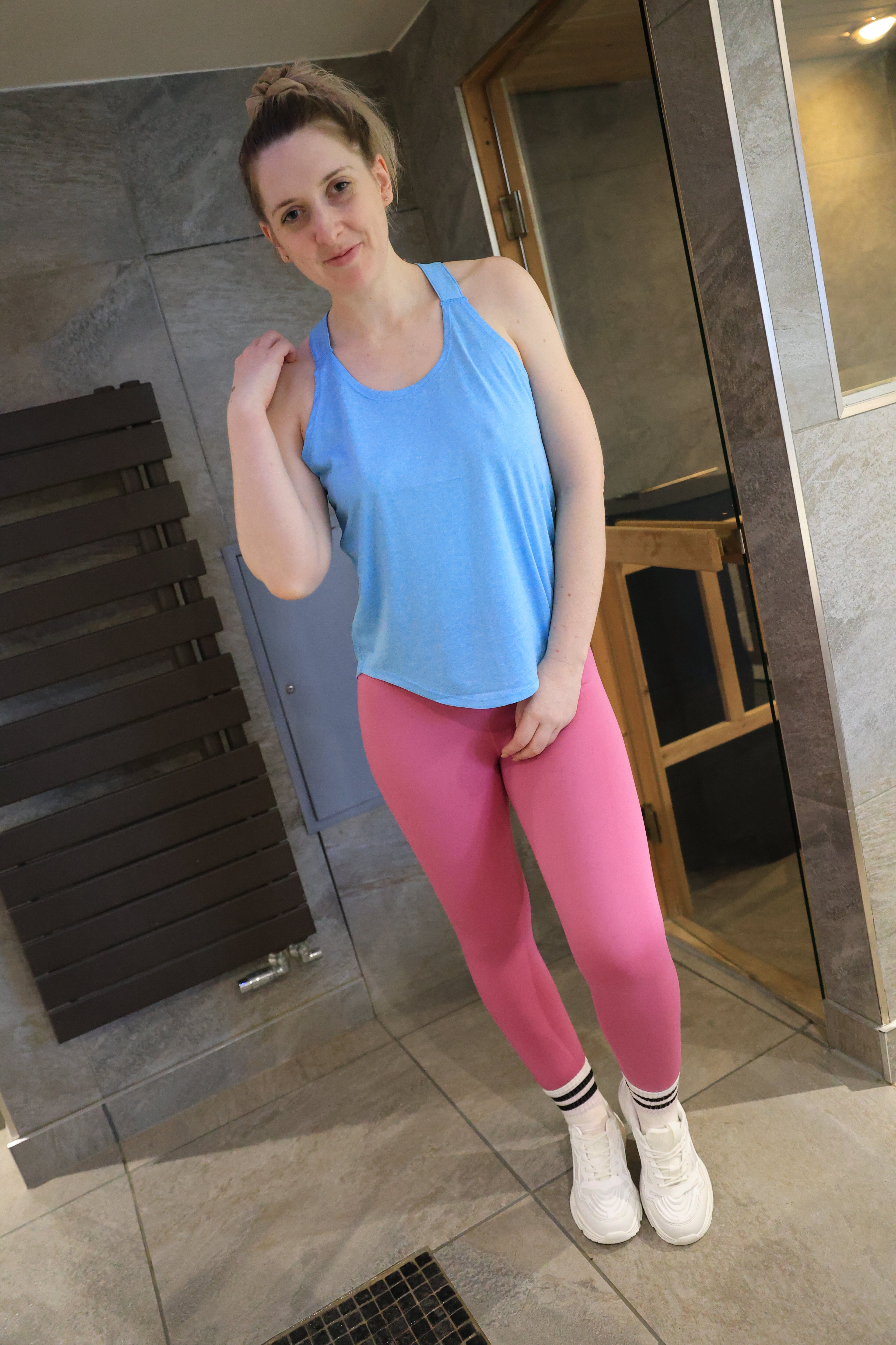 Pink Leggings, Blue Running Top, Socks and Trainers In The Shower & Hottub