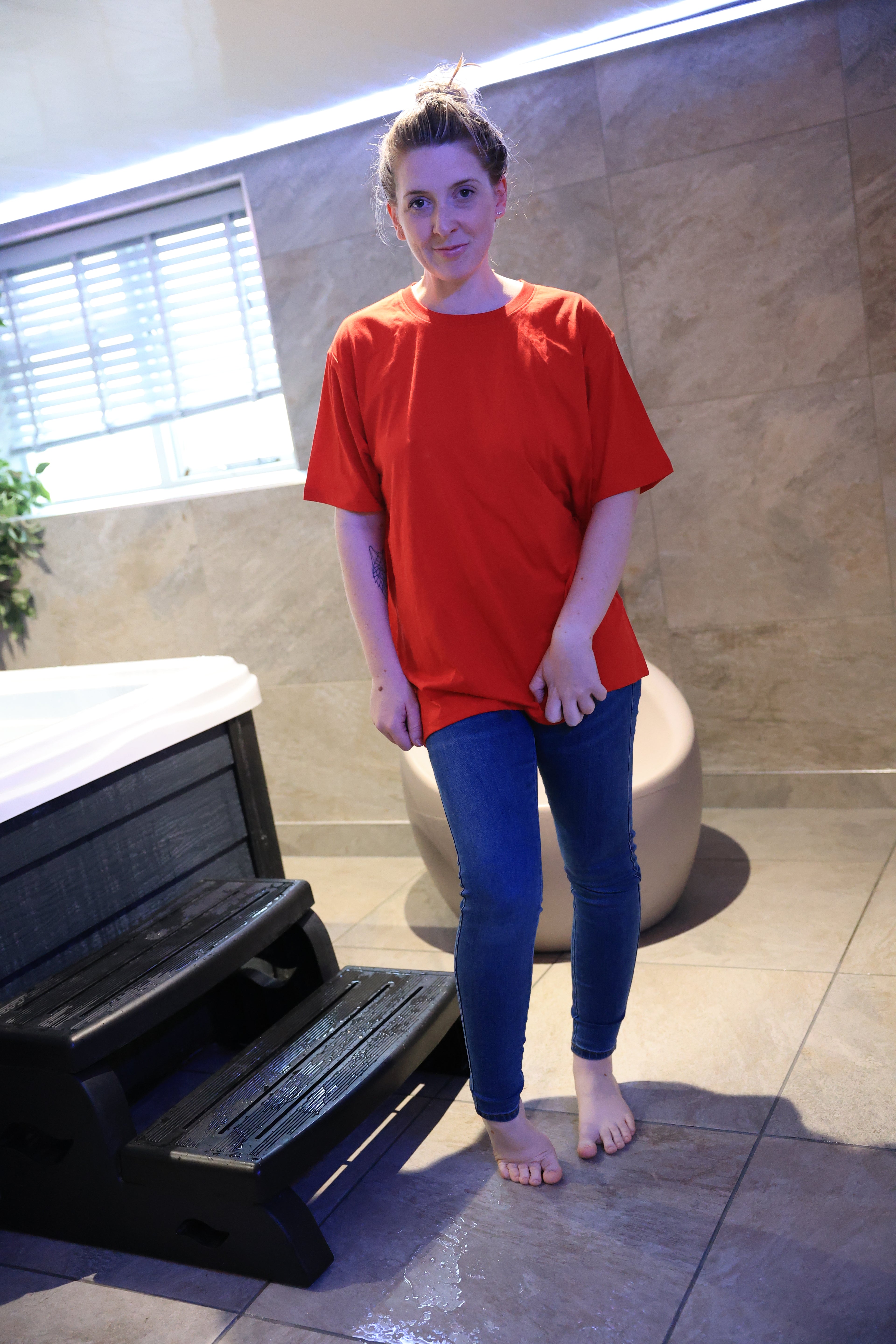 Bright Red T-Shirt and Jeans in Shower and Hot Tub