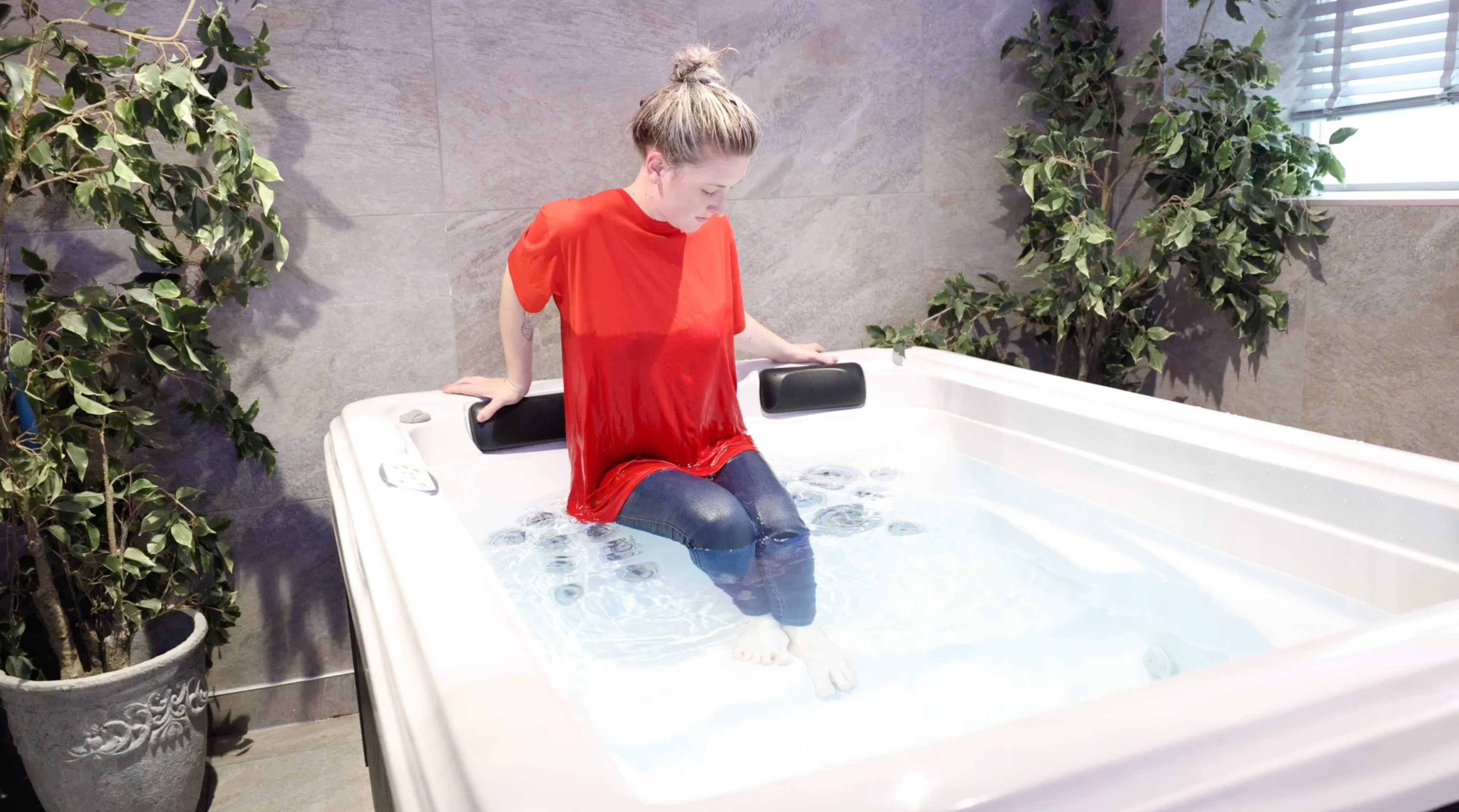 Bright Red T-Shirt and Jeans in Shower and Hot Tub