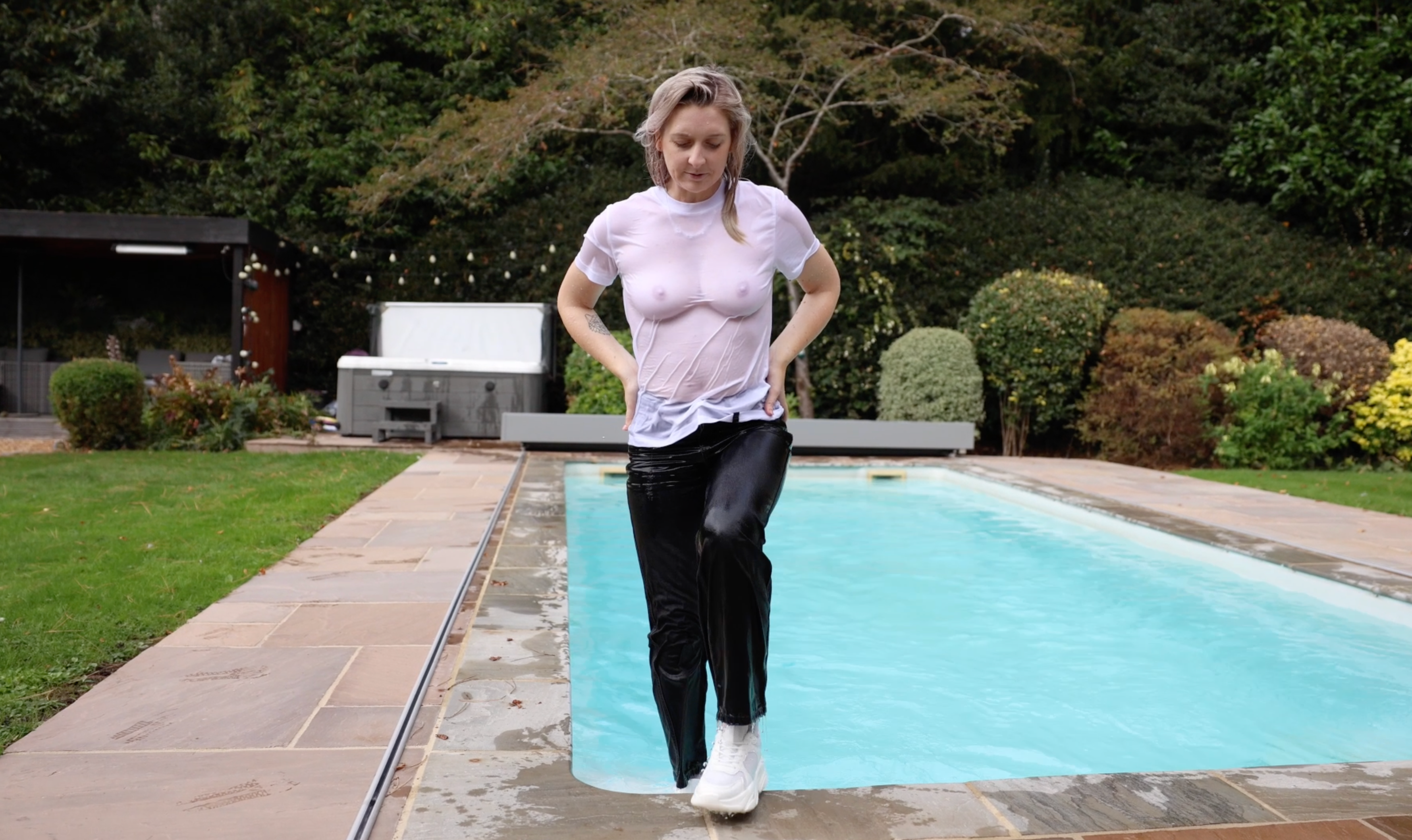 Hoodie, T-Shirt, Jeans and White Trainers In The Pool