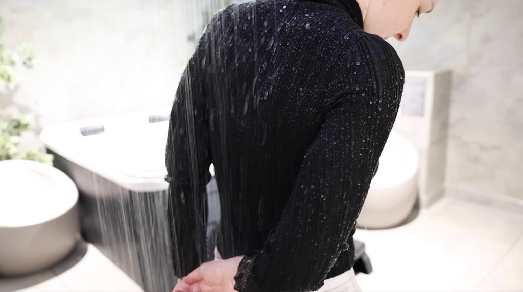 Black Turtle Neck Sweatshirt & White Trousers In the Shower & Hottub