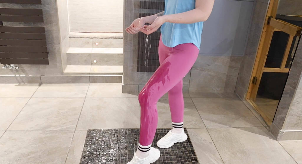 Pink Leggings, Blue Running Top, Socks and Trainers In The Shower & Hottub