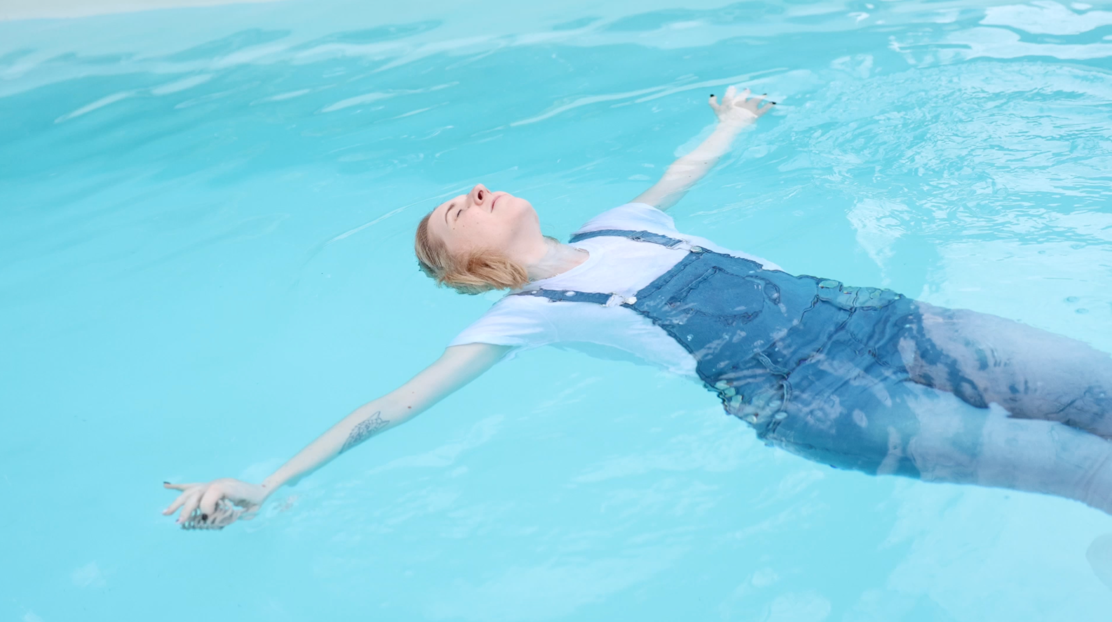 Denim Dungarees, White T-Shirt, Socks and Trainers In The Pool!