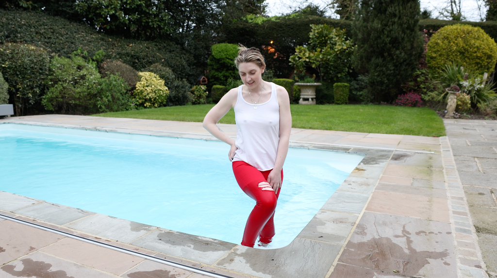 Red jeans and White Tank Top In Pool & Hottub