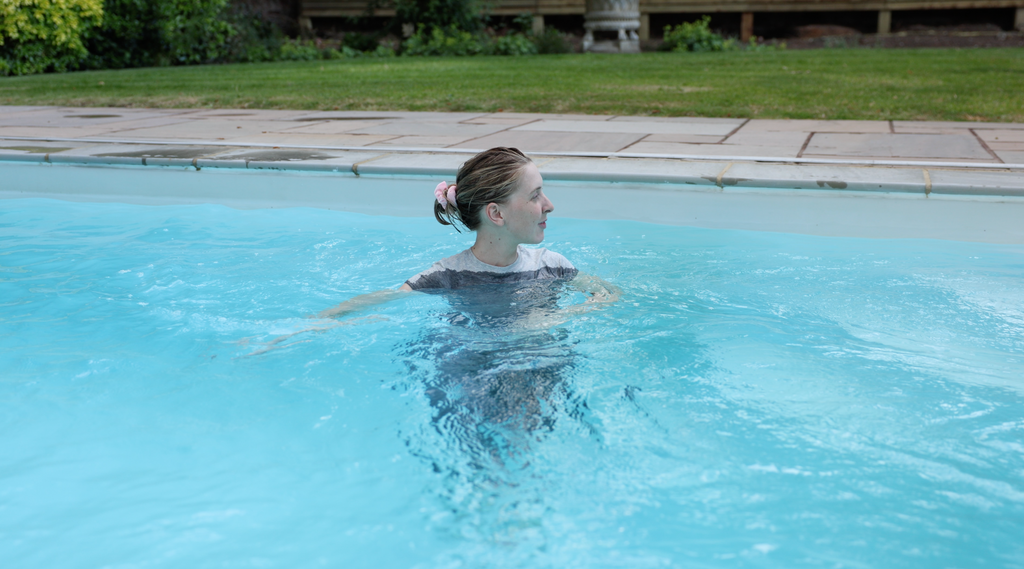 Grey T-Shirt & Grey Joggers In The Pool