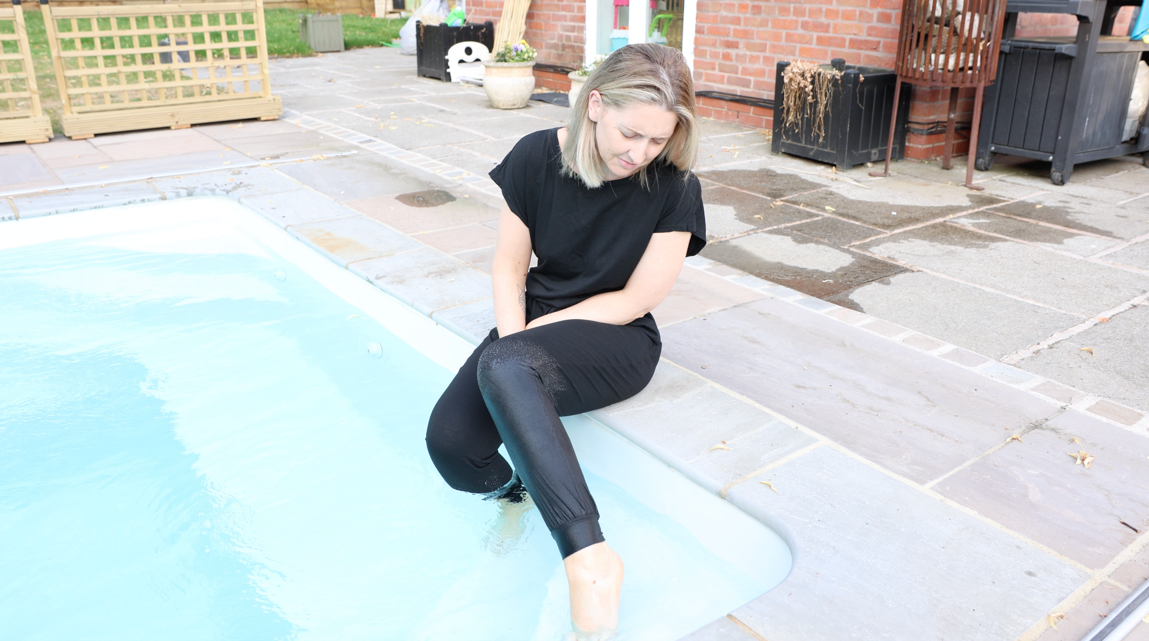 Black Jumpsuit In The Pool & Hottub